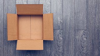 Empty box on wooden table